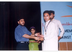 Tariq Mehmood presented Gold Medal & Shield. (2004)