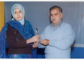 Riaz Bokhari Asstt: Contorller GCU presented Gold Medal & Shield to Ammara Tariq. (2006)

