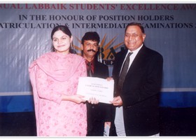 

GenÃ‚Â® Moin-ud-Din Haider presented  Cash Scholarship to Saira. (2006)