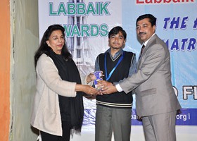 Madam Shahnaz Malhi Professor NCA presented Gold Medal & Shield to Ahmad Masood Ã¢â‚¬â€œ 1st Overall BISE Multan (2012)