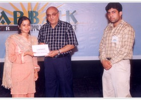 
Amjad Islam Amjad presented Cash Scholarship to Amna Moazzam. (2005)