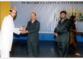 Ghulam Ahmad Div. President 300-NGOÃ¢â‚¬â„¢s Network of ANF presented Shield to Hafiz Sana Ullah. (2006)