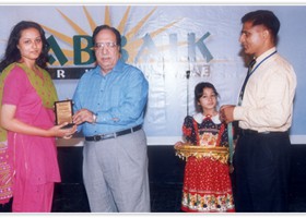 Atta-ul-Haq Qasmi presented Gold Medal & Shield to Marium Lodhi. (2005)