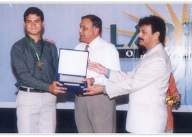 GenÃ‚Â® Moin-ud-Din Haider presented Gold Medal & Shield to Saad Omar 1st Overall Intermediate. (2005)