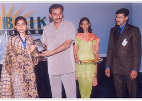 Haji Mohammad Dogar Secretary BISE-Lahore presented Gold Medal & Shield to Sania Rehmat. (2005)