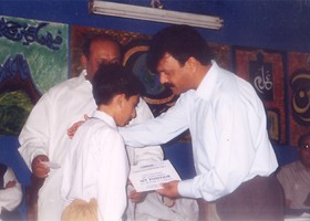 

Nisar Zia Chairman LFW presented Cash Scholarship to Junaid Ahmand. (2003
