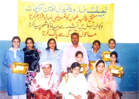 
Shafaqat Yasin Secretary Info LFW presented School Bag & Uniform to student (2013)