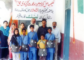 
NNisar Zia Chairman LFW presented School Bag & Uniform to student (2013)